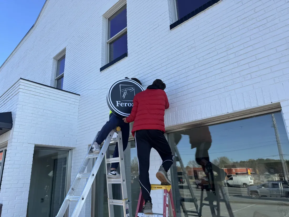 Ferozzi Furniture - facade letters after the new sign went up