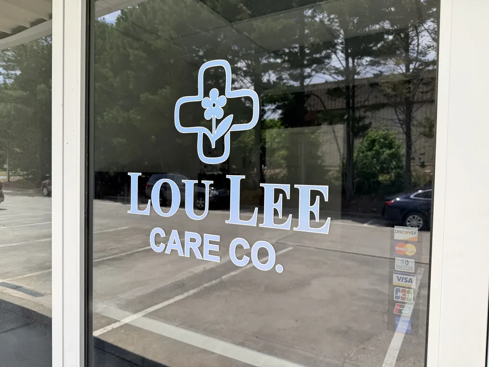 Frosted-look window graphics on a storefront glass door